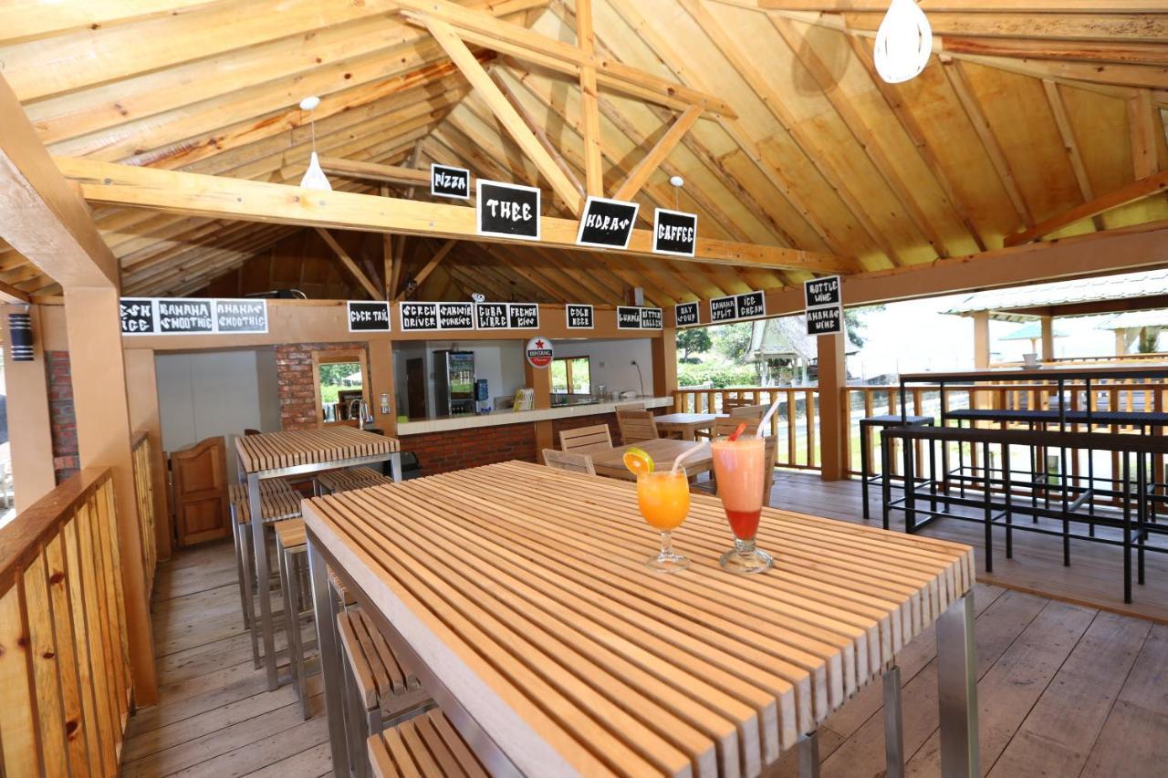 Toba Village Inn Tuk Tuk Exterior photo